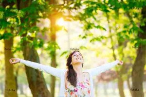 Woman enjoying happiness and hope on spring